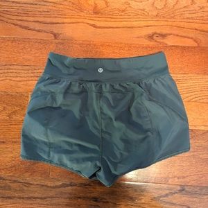 Sage green Lululemon running shorts size 8